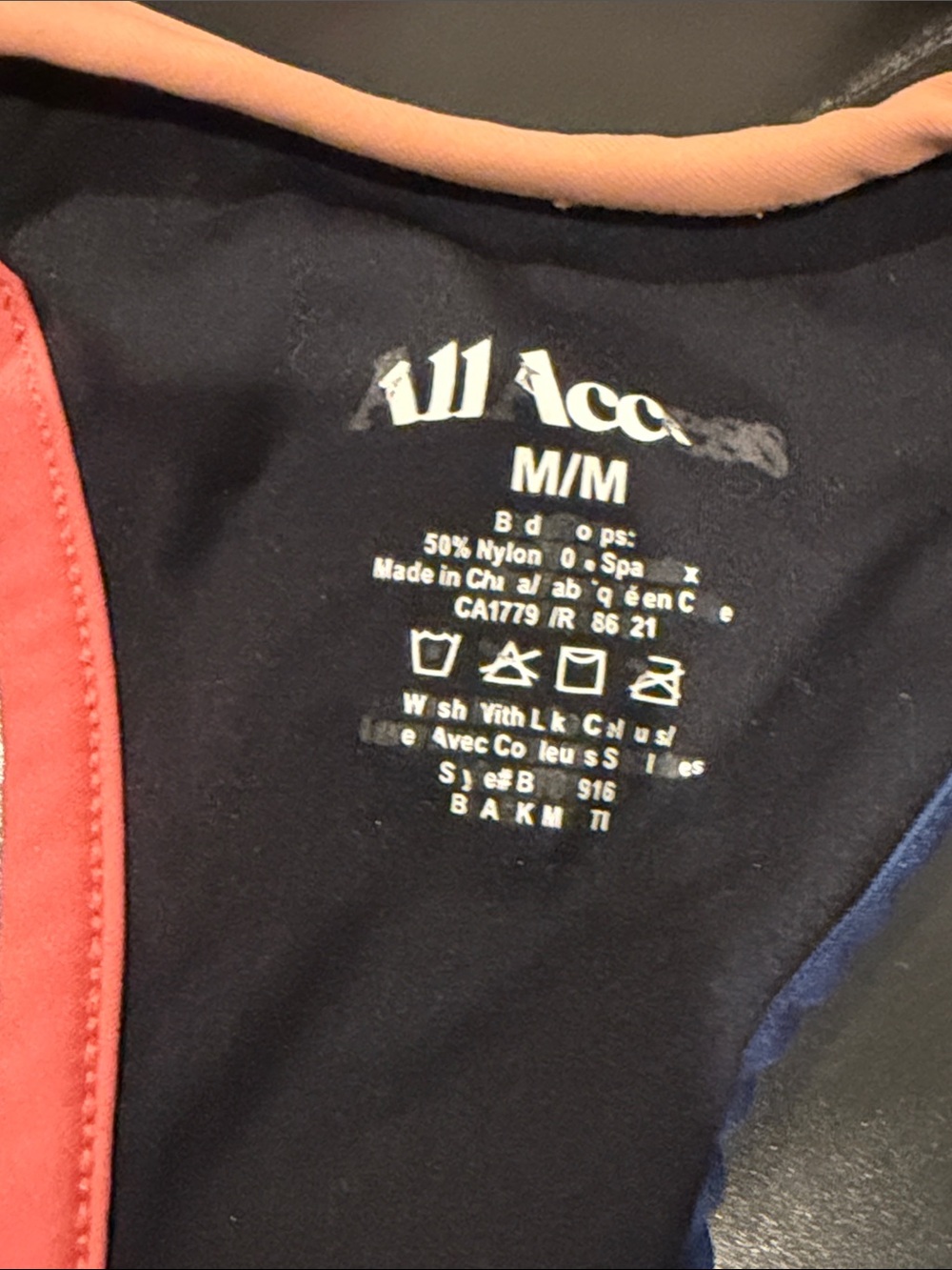 ALL ACCESS Black Sports Bra with Peach, Coral and Blue Trim - Picture 3 of 3